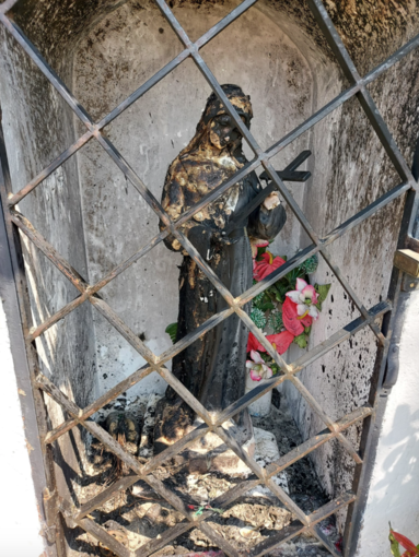 Danneggiata dal fuoco la statua di Santa Rita: l'Isola a Vercelli si mobilita per il restauro