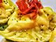 Ricetta: Mezzelune ripiene con capasanta e burrata su crema di basilico e ciuffetti di prosciutto crudo