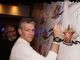 Foto: Filippo regis firma il wall della &quot;Dj Reunion di Rimini&quot; marzo 2022,dietro Max Monti (Gam Gam) e Maurizio Nari di Nari&amp;Milani