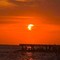 Eclissi parziale di sole, lo spettacolo al tramonto nei cieli d'Italia